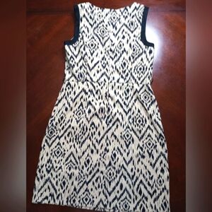 AGB.PRETTY BEIGE DRESS WITH BLACK ACCENTS..